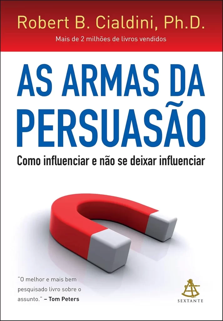 Capa do livro "As armas da persuasão" de Robert B. Cialdini, apresentando um ímã em forma de U, que simboliza a atração e o poder de influenciar e ser influenciado.