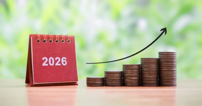 Calendário 2026 e pilhas de moedas crescentes representando dividendos 2026 e rendimentos