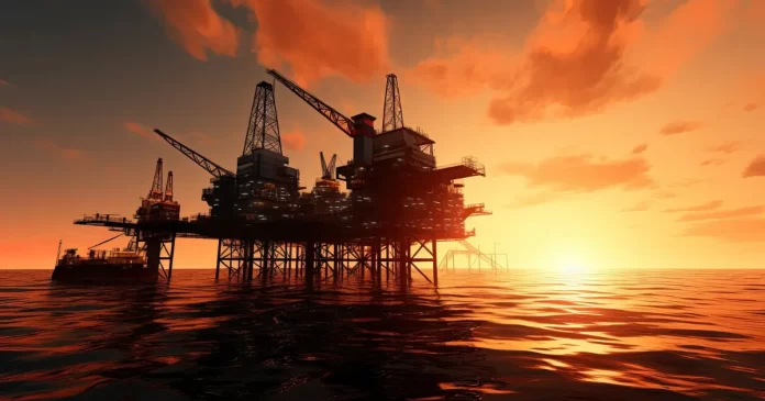 Plataforma de petróleo em alto-mar ao pôr do sol, representando a alta do preço do petróleo e o impacto positivo nas ações PETR4 e PRIO3.